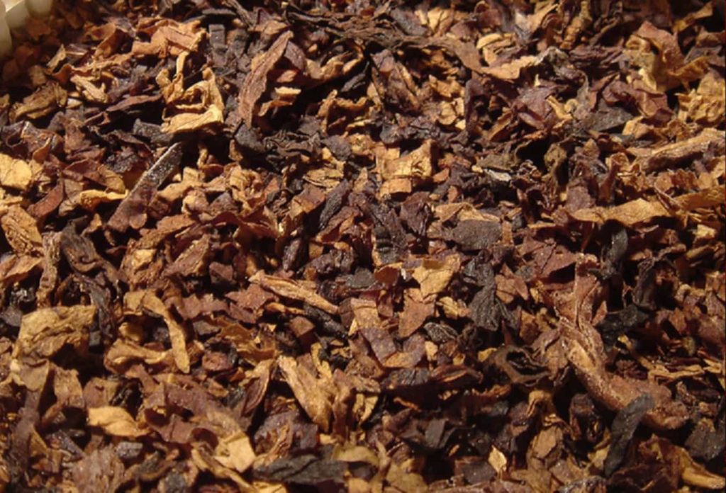 Flue-cured Virginia tobacco showcasing its distinct color